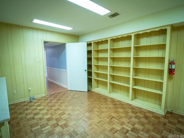 spare room featuring visible vents