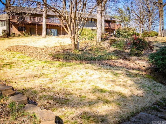 view of yard with a wooden deck