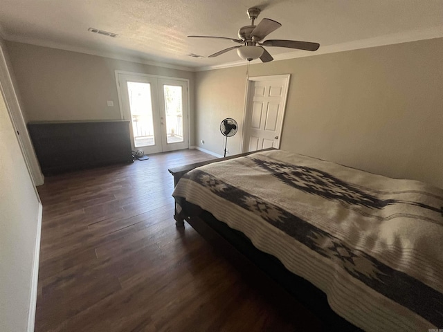 bedroom featuring french doors, visible vents, ornamental molding, wood finished floors, and access to outside