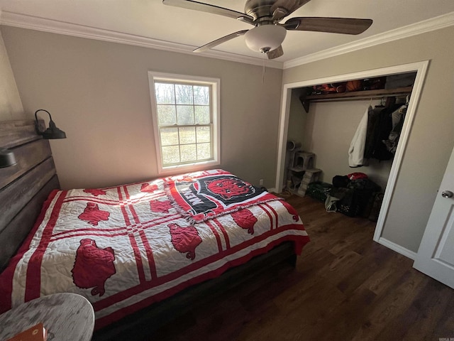 bedroom with a closet, wood finished floors, a ceiling fan, and crown molding