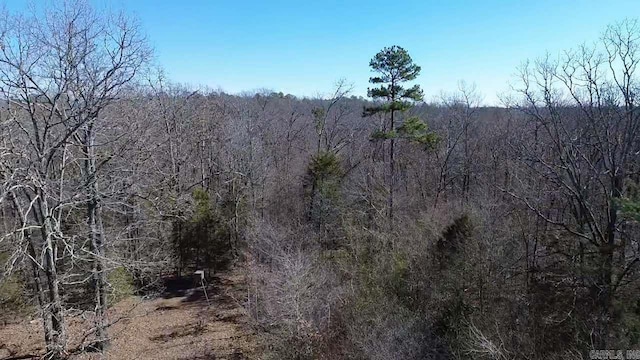 view of landscape with a view of trees