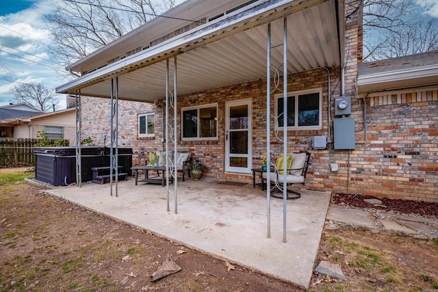 view of patio featuring fence