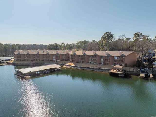 property view of water featuring a residential view and a floating dock