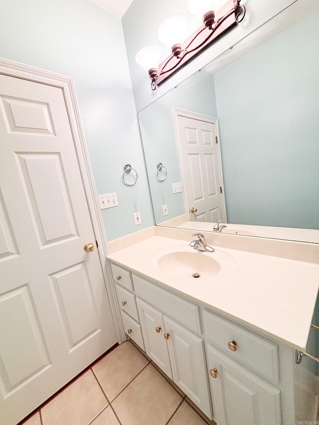 bathroom with vanity and tile patterned floors