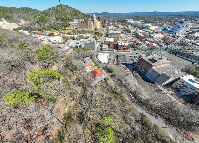 bird's eye view featuring a view of city and a mountain view