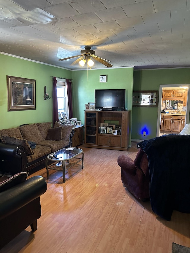 living area featuring ceiling fan and light wood finished floors