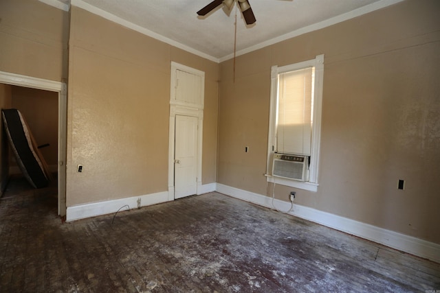 unfurnished bedroom featuring ornamental molding, a ceiling fan, wood finished floors, cooling unit, and baseboards