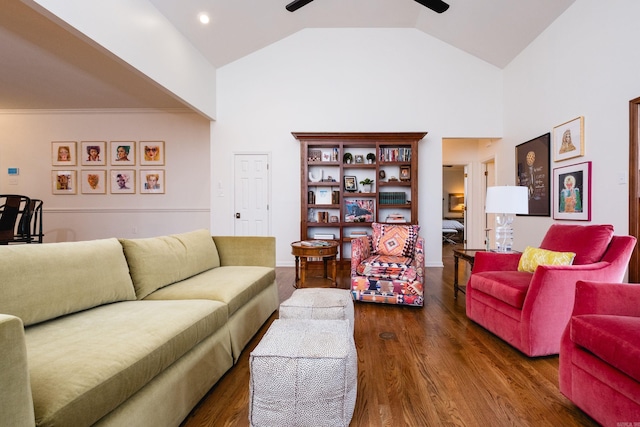 living area featuring high vaulted ceiling, a ceiling fan, and dark wood-style flooring