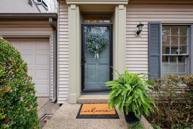 property entrance with a garage