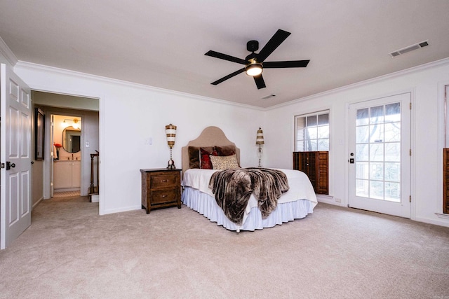 bedroom featuring ornamental molding, light colored carpet, access to outside, and visible vents