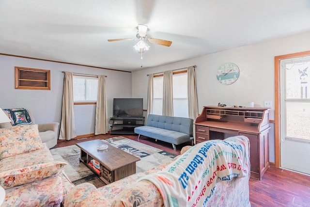 living room with ceiling fan and wood finished floors