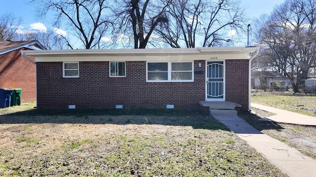 bungalow-style house featuring brick siding, crawl space, and a front lawn