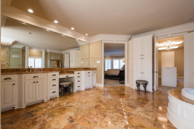 bathroom with connected bathroom, recessed lighting, crown molding, and vanity