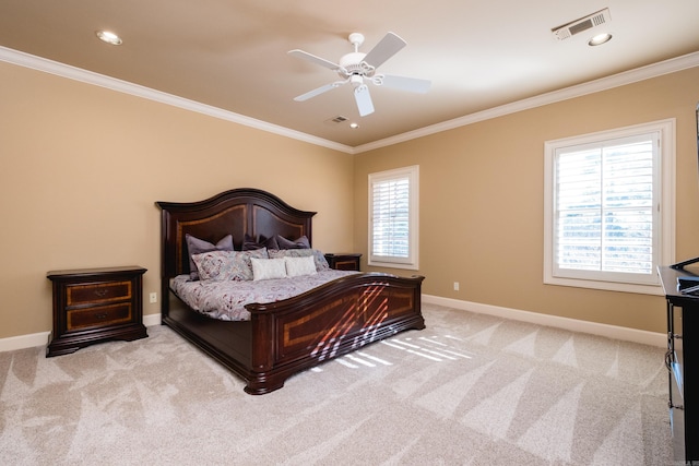 bedroom featuring baseboards, carpet, visible vents, and crown molding