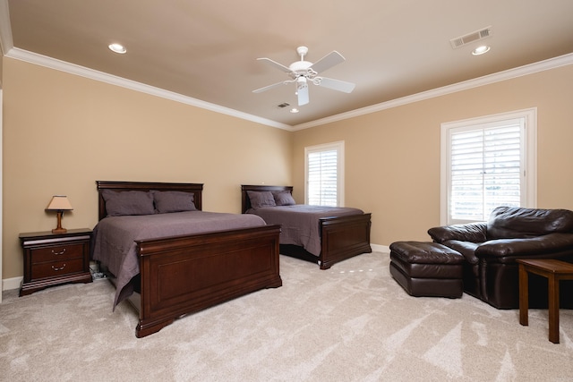 bedroom featuring light carpet, visible vents, and crown molding