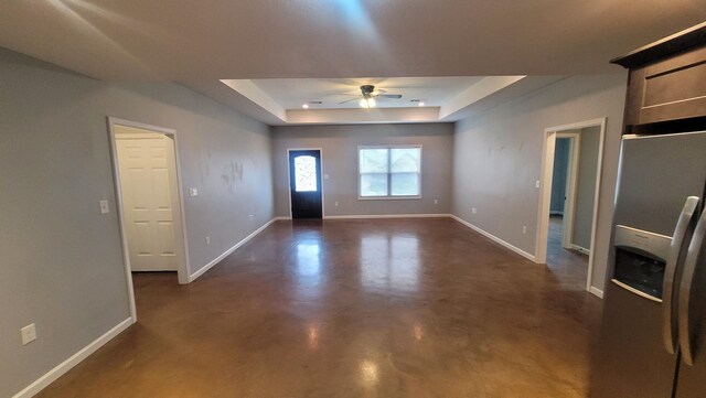 1108 Ava Ln, Paragould, AR 72450 - entrance foyer featuring a raised ceiling, concrete floors, and baseboards
