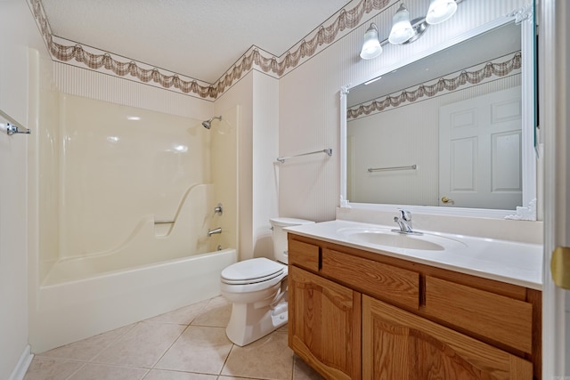 bathroom featuring toilet, shower / tub combination, tile patterned flooring, a textured ceiling, and vanity