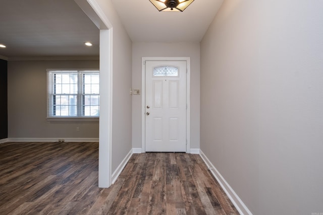 entrance foyer featuring baseboards, dark wood-style flooring, and recessed lighting