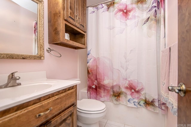 bathroom with toilet, vanity, shower / bath combo with shower curtain, and tile patterned floors