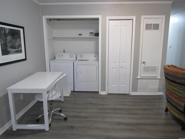 laundry room featuring laundry area, dark wood-type flooring, visible vents, baseboards, and washer and dryer