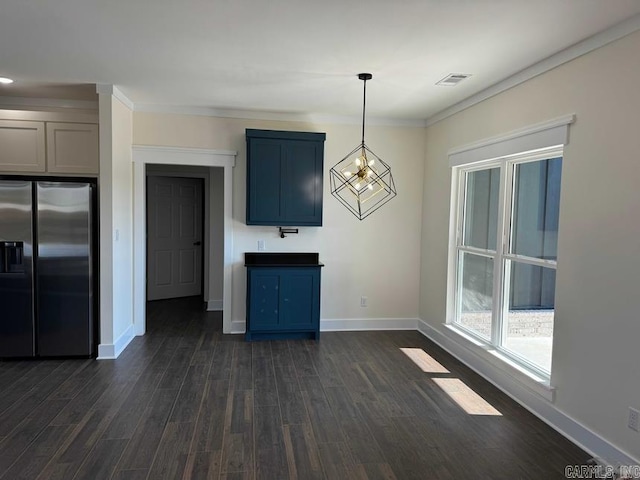 interior space featuring ornamental molding, dark wood finished floors, visible vents, and baseboards