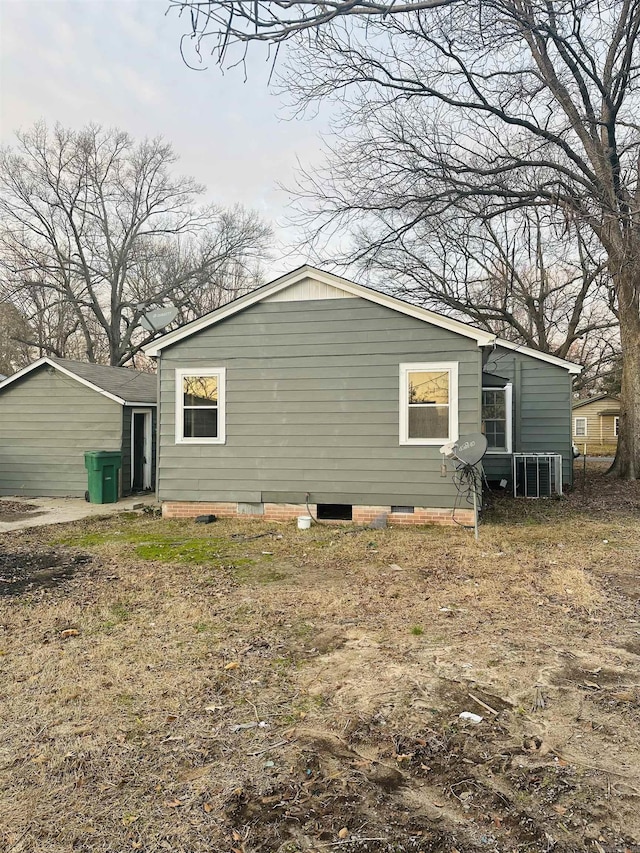 view of property exterior featuring crawl space