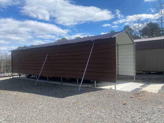 view of outdoor structure with a carport