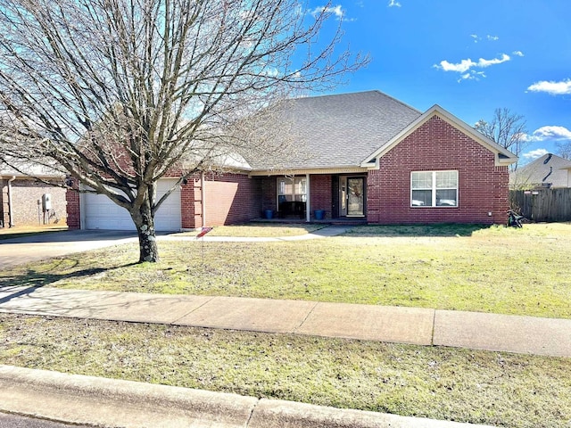 single story home featuring an attached garage, brick siding, fence, driveway, and a front lawn