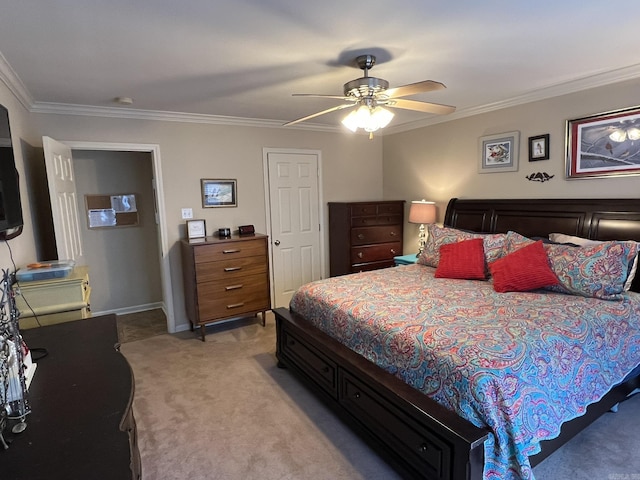 bedroom with ornamental molding, a ceiling fan, and light colored carpet