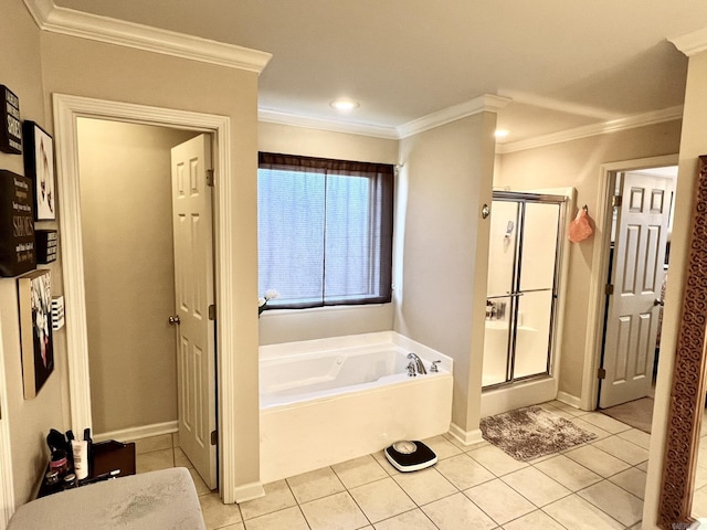 bathroom with a stall shower, tile patterned flooring, and a bath