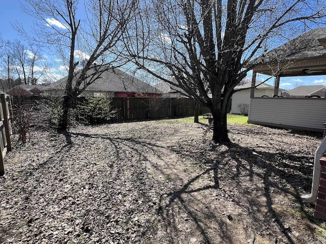 view of yard with fence