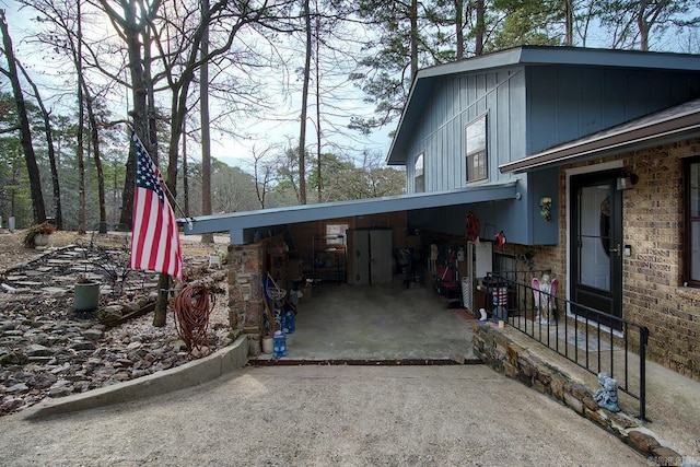 view of home's exterior with brick siding