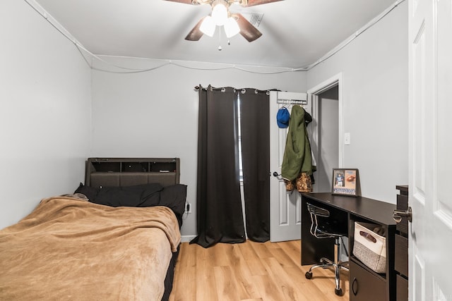 bedroom featuring ceiling fan and light wood-style flooring