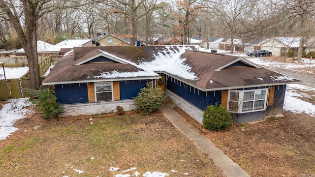 exterior space featuring brick siding