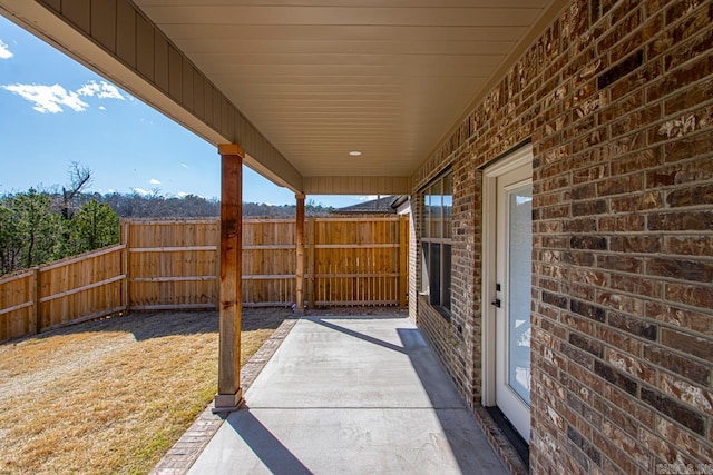 view of patio with fence