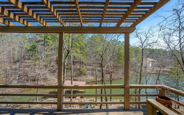 wooden deck with a forest view