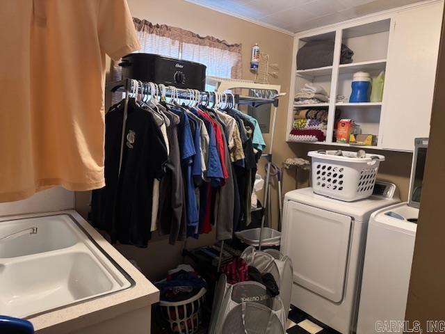 laundry area with laundry area and washing machine and clothes dryer