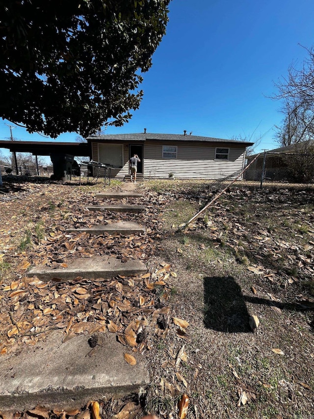 back of property with entry steps