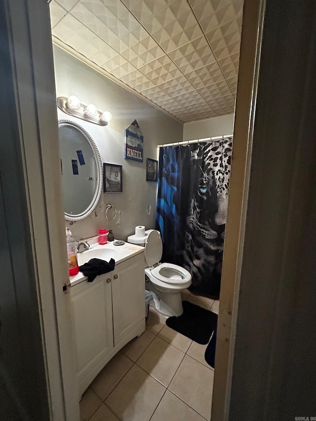 full bath with toilet, vanity, a shower with shower curtain, and tile patterned floors