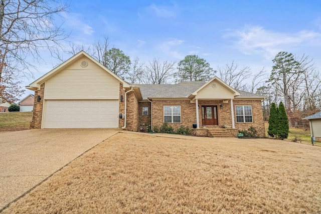 single story home with brick siding, a shingled roof, concrete driveway, a garage, and a front lawn