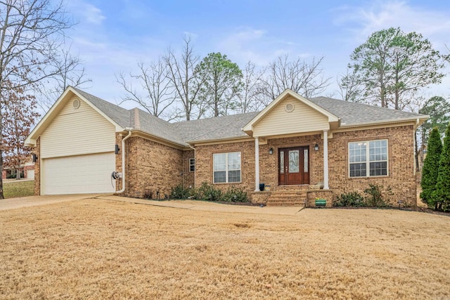 ranch-style house featuring brick siding, a shingled roof, concrete driveway, a garage, and a front lawn