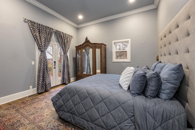 bedroom with ornamental molding, access to outside, baseboards, and wood finished floors