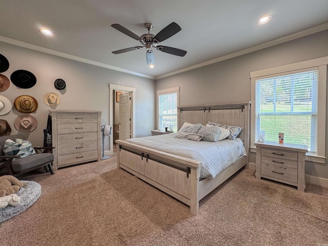 carpeted bedroom featuring a ceiling fan, recessed lighting, crown molding, and baseboards