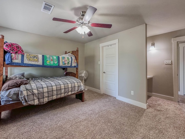 carpeted bedroom with baseboards, visible vents, and ceiling fan