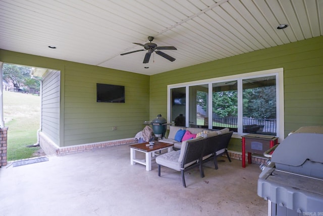 view of patio / terrace featuring ceiling fan, fence, outdoor lounge area, and grilling area