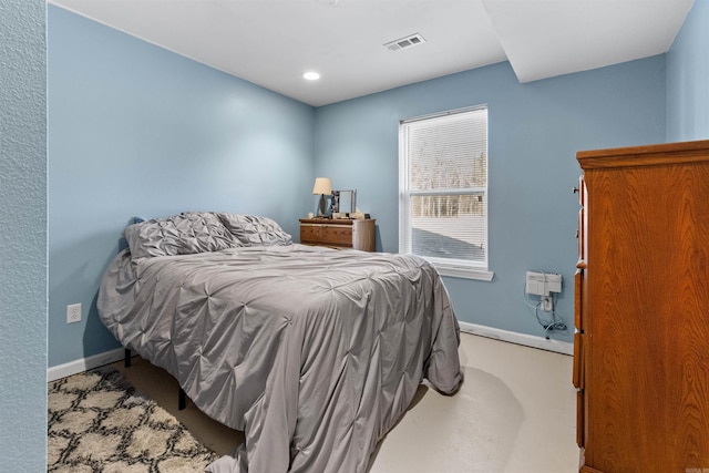 bedroom featuring visible vents and baseboards