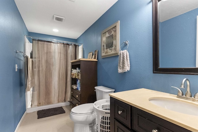 bathroom featuring toilet, curtained shower, vanity, and visible vents