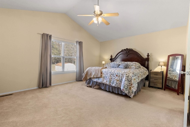 bedroom with visible vents, baseboards, light colored carpet, lofted ceiling, and ceiling fan