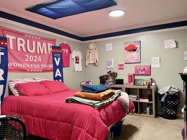 bedroom featuring carpet floors and crown molding