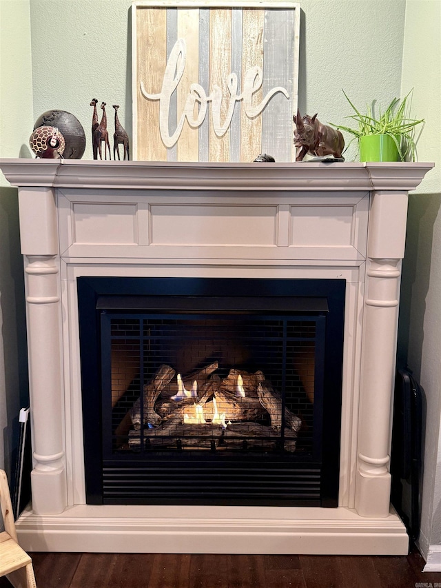 room details with a textured wall and a fireplace